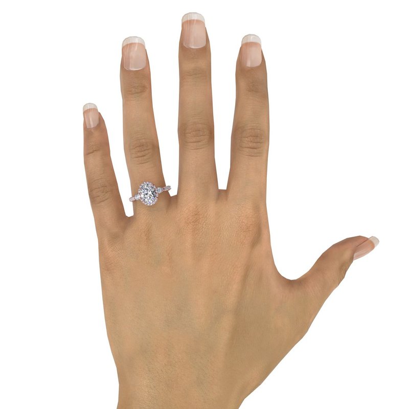 Oval Diamond Halo Engagement Ring With Pear-Shape Diamond