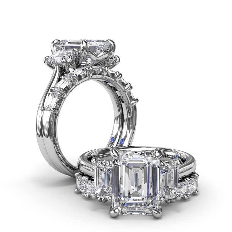 3 stone emerald cut engagement rings