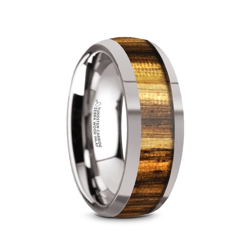 Thorsten TIGRE Tungsten Carbide Polished Finish Men’s Domed Wedding Band with Zebra Wood Inlay - 8mm Thorsten TIGRE Tungsten Carbide Polished Finish Men’s Domed Wedding Band with Zebra Wood Inlay - 8mm