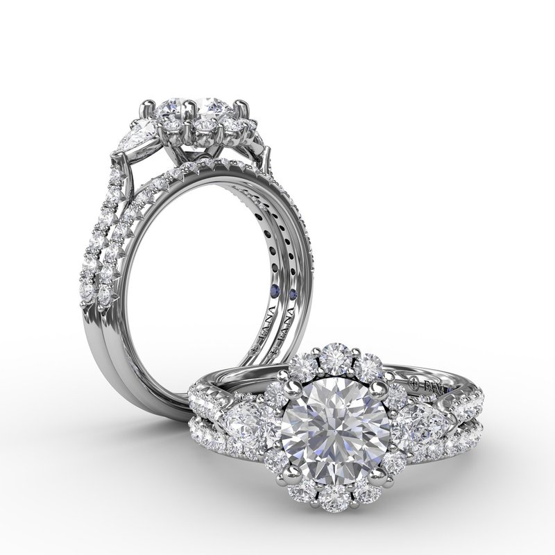 Three-Stone Diamond Halo Engagement Ring With Pear-Shape Side
